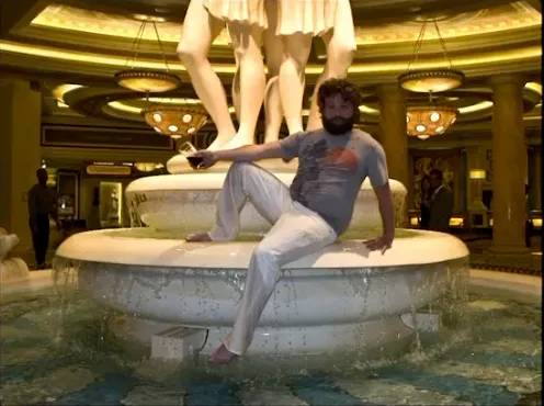 Laughing way too hard by the fountain at Caesars Palace, drink in hand, already plotting trouble.