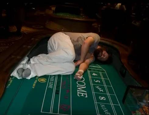 The craps table looked so comfortable, I just had to curl up for a quick power nap.